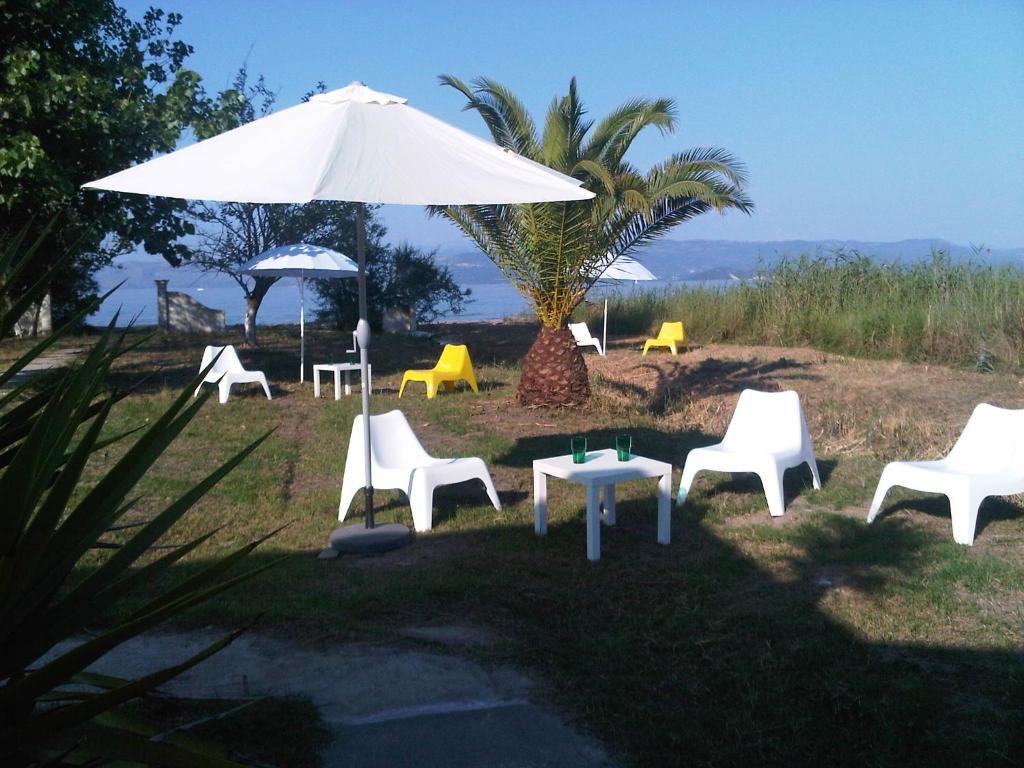 Virginia'S Beachfront Apartments Kávos Екстериор снимка
